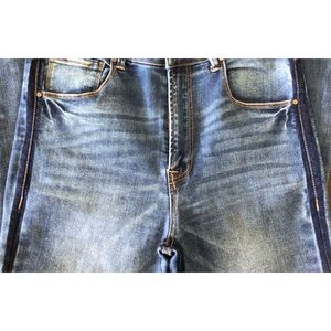 Tricot light wash non distressed with dark wash seams inside & outside leg